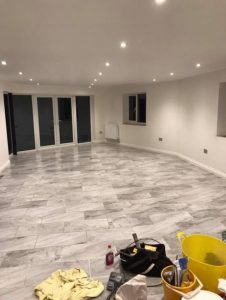 Floor tiling and kitchen down lights
